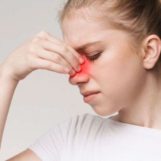 Traveler experiencing sinus pressure relief after sinus surgery, showing improved comfort during air travel.